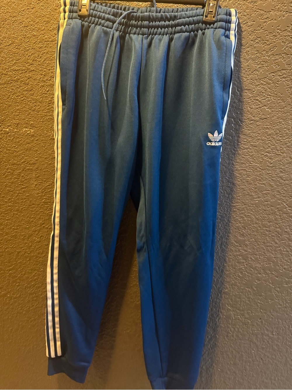 adidas women’s Blue Jogger Sweatpants with White Side Stripes